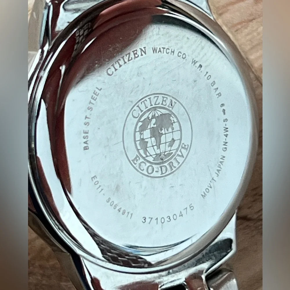 Citizen Eco-Drive Ladies Watch Two-Tone Bracelet White Dial Date Window